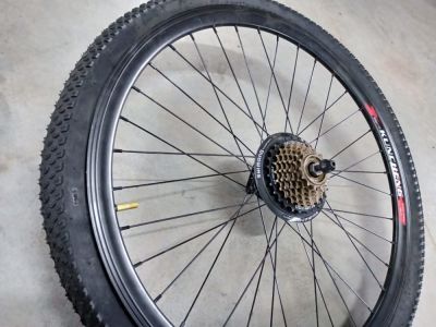 колесо 26" в сборе заднее со звездой shimano (7 скоростей) под диск. тормоз (без диска)